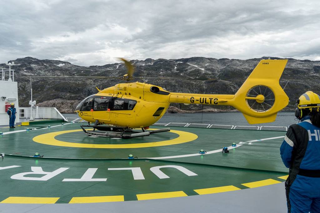 Quark Expeditions' twin-engine helicopters enable guests to experience immersive adventures along the Tasermiut Fjord in South Greenland.