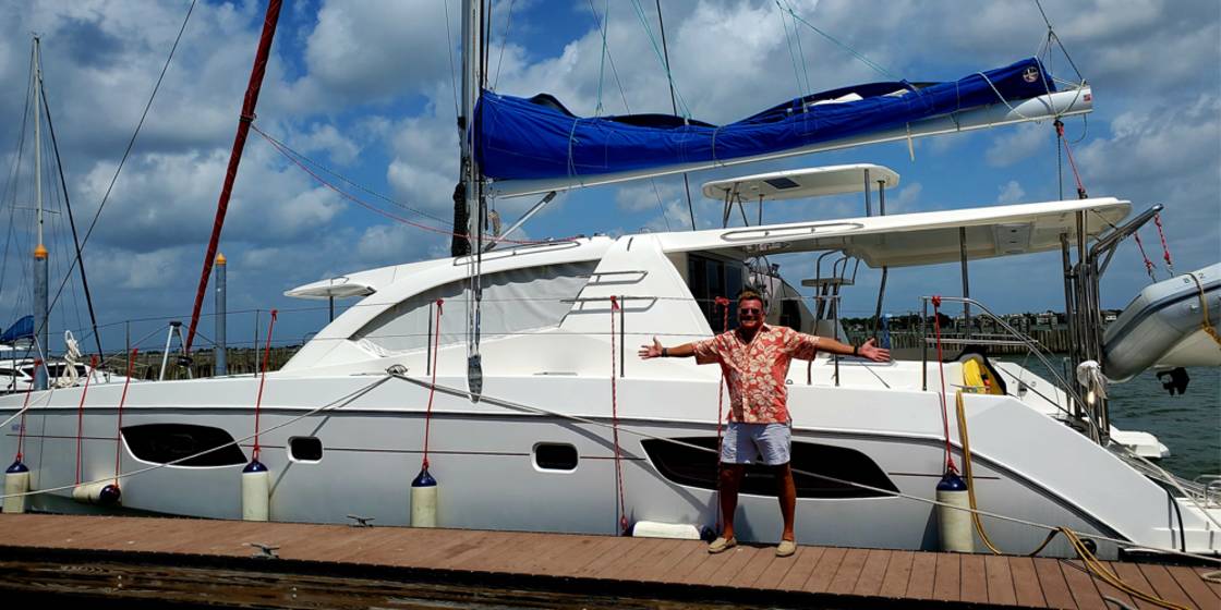 Leopard 44 owner in front of his boat