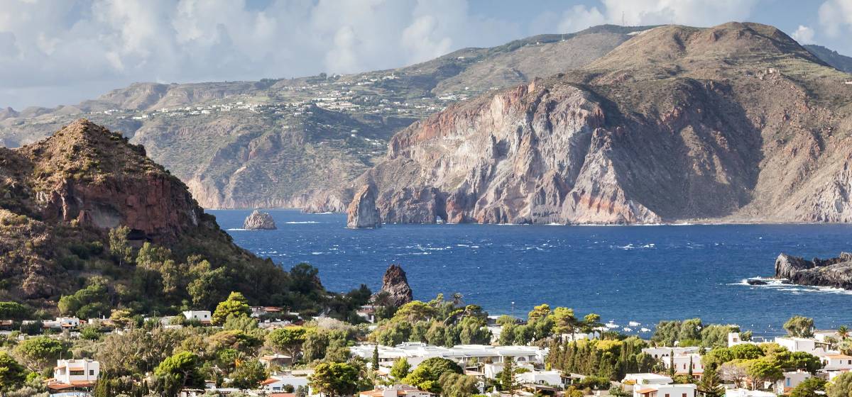 Italian coast with mountains, greenery and blue water