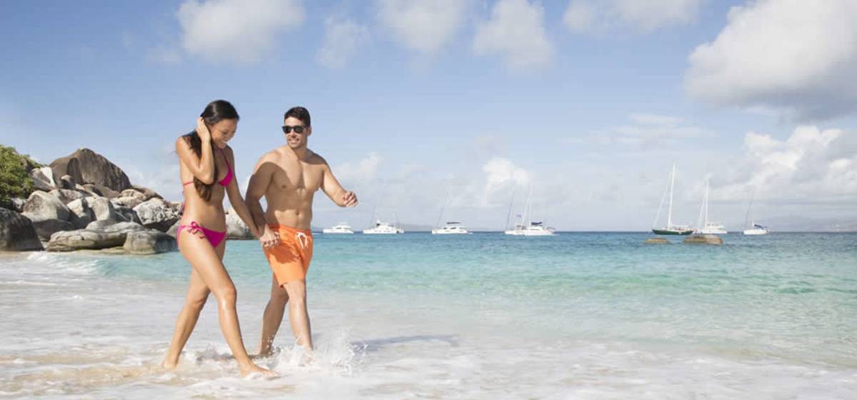 Couple walking on beach