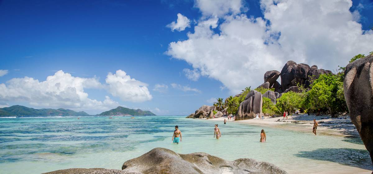 People in Seychelles sea