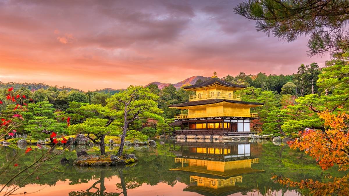 Enchanting Travels Japan Tours Kyoto, Japan at Kinkaku-ji, The Temple of the Golden Pavilion at dusk