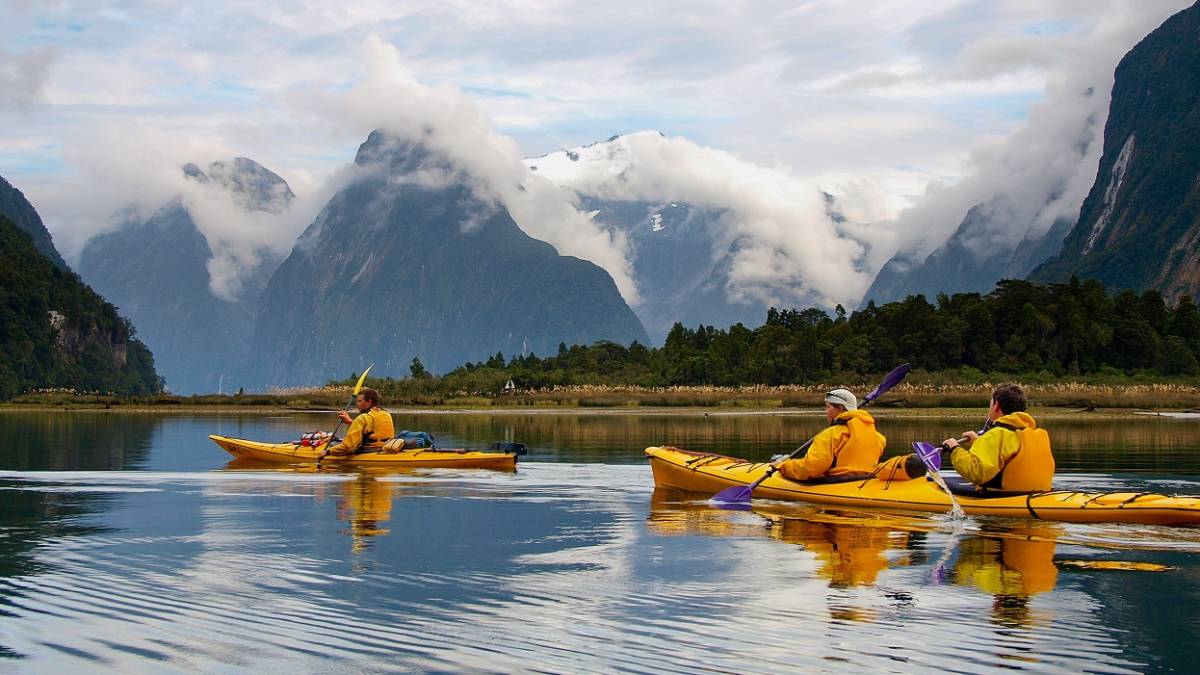 Enchanting Travels New Zealand Tours sea kayak in Milford Sound, New Zealand