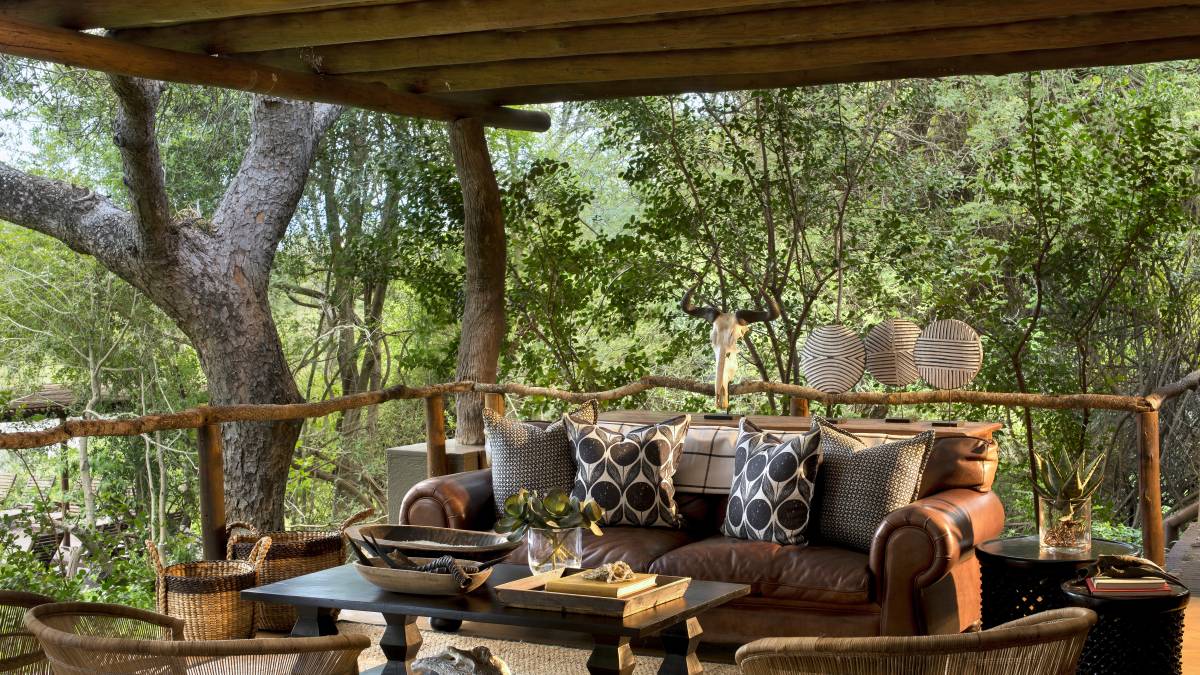 Outdoor lounge area at Lion Sands Tinga Lodge Hotel, South Kruger in South Africa