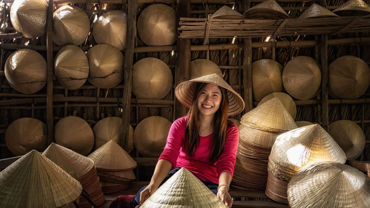 Vietnamese hat-maker in Ho Chi Minh City, Vietnam
