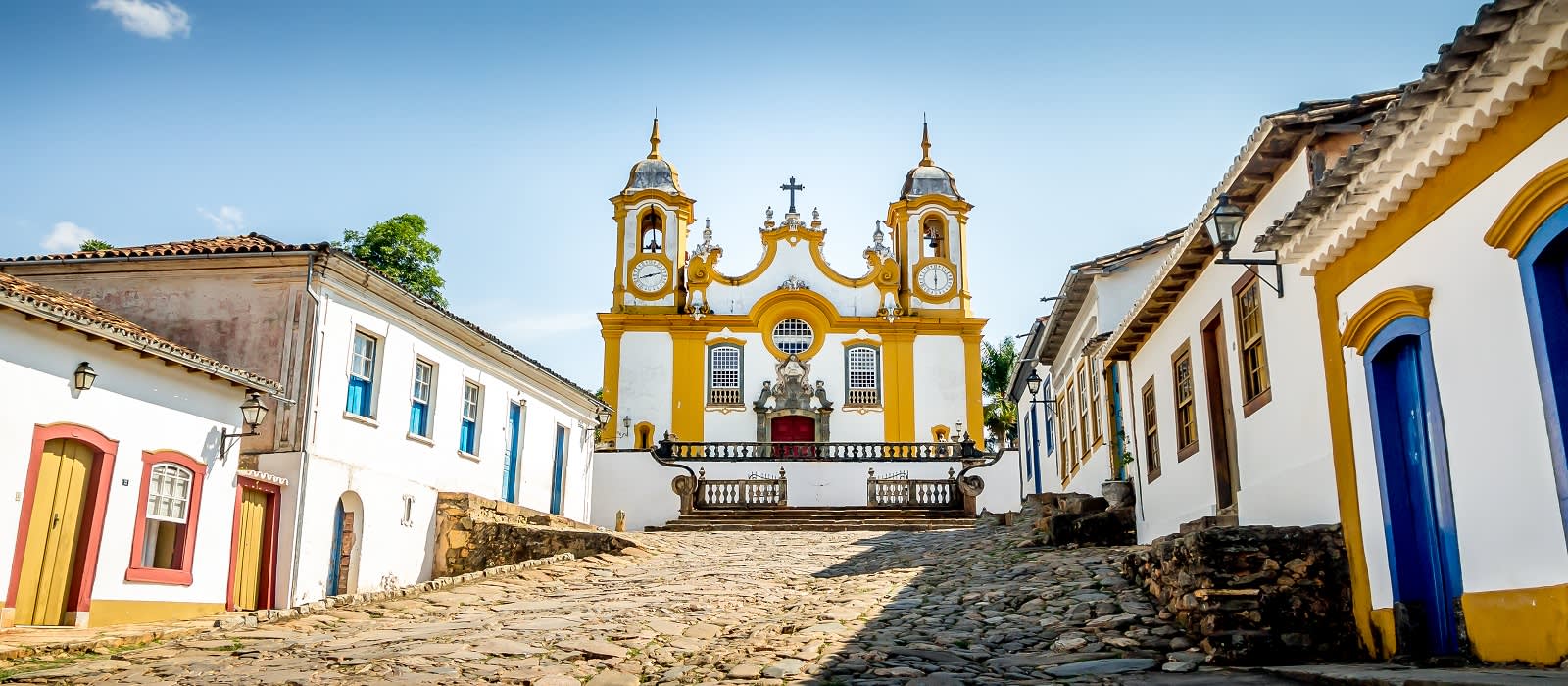Colorful colonial houses and church in city of Tiradentes