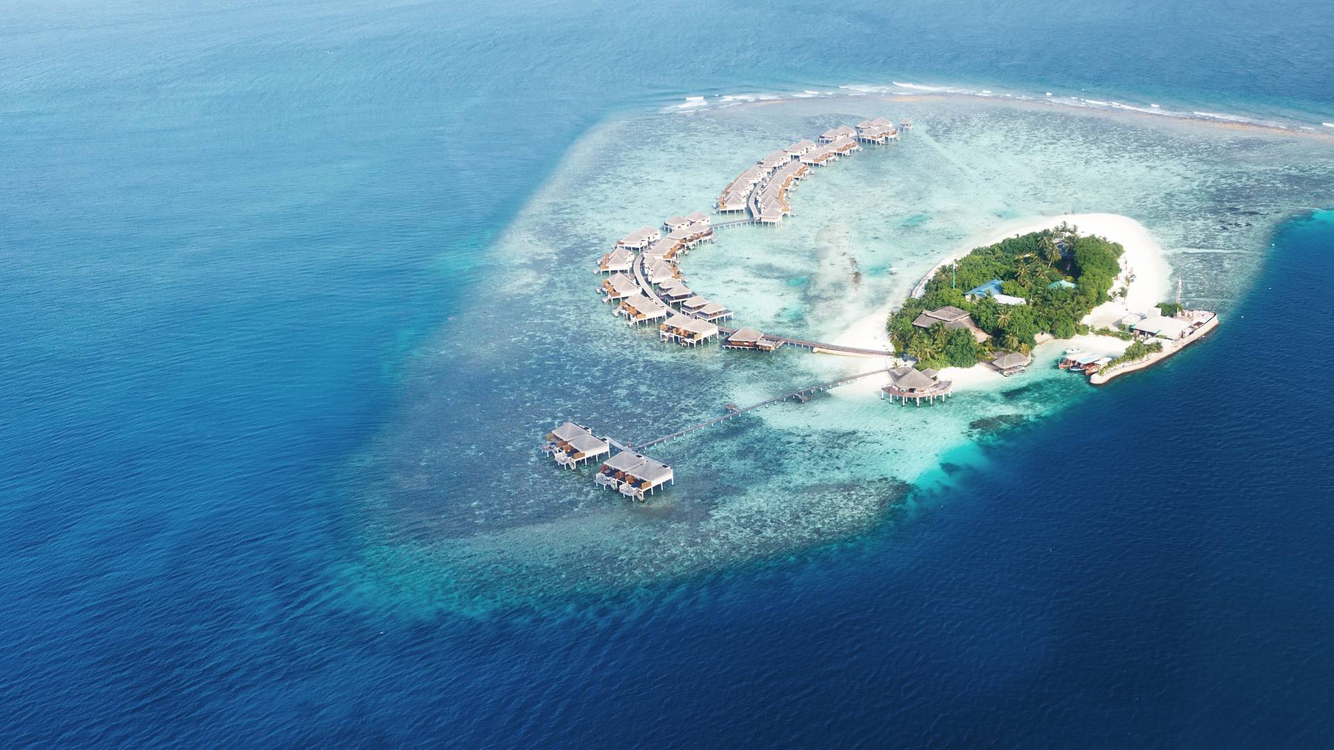 Group of atolls and islands in Maldives from aerial view, Asia