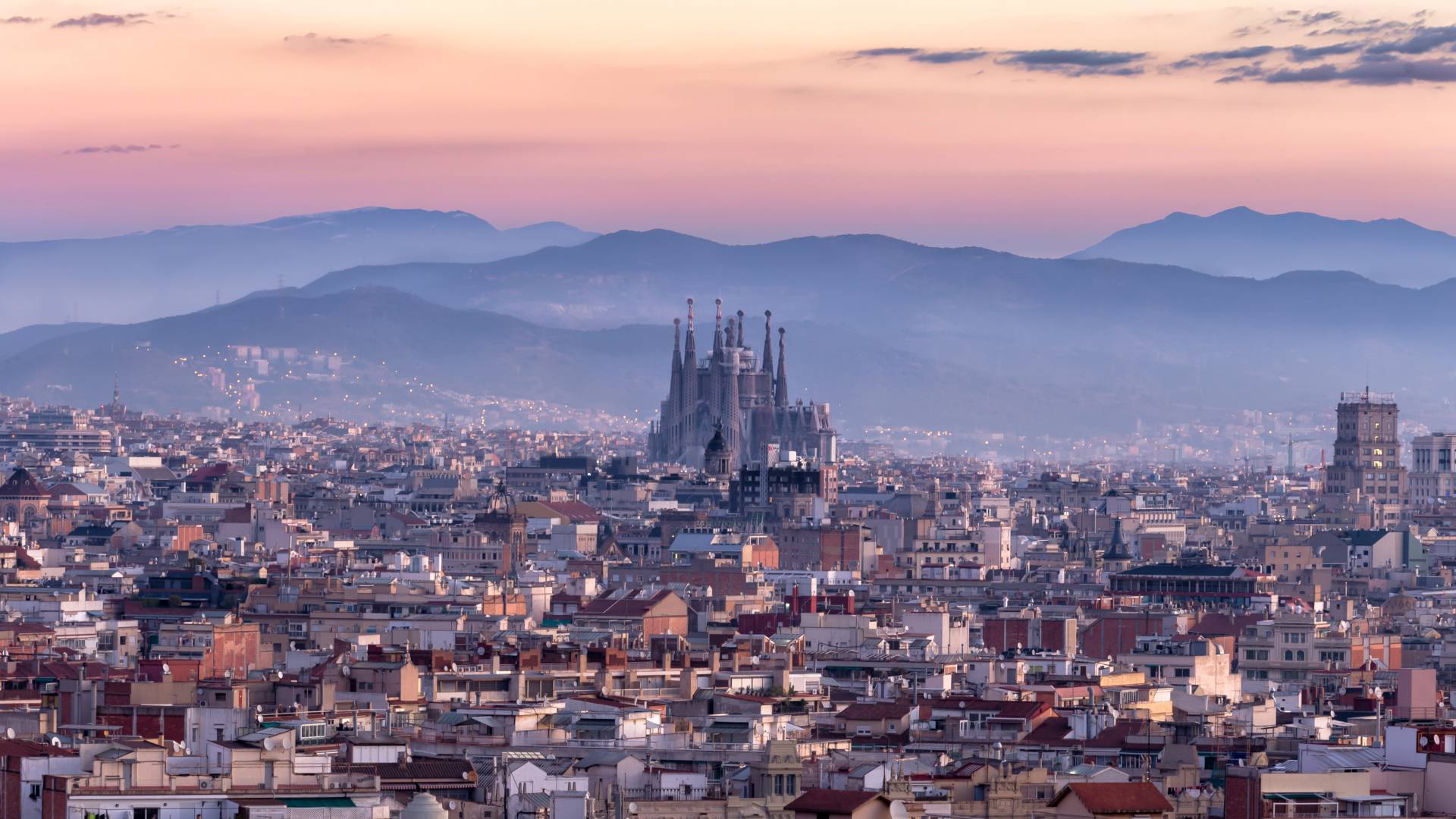 Sagrada familia and panorama view of barcelona city at dusk ,Spain