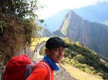 Boy arriving at Machu Picchu, Peru