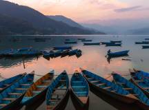 Boats on Phewa Lake at Sunset