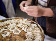 Dumplings with minced meat filling and onions steamed in the traditional nepalese way in a bamboo basket