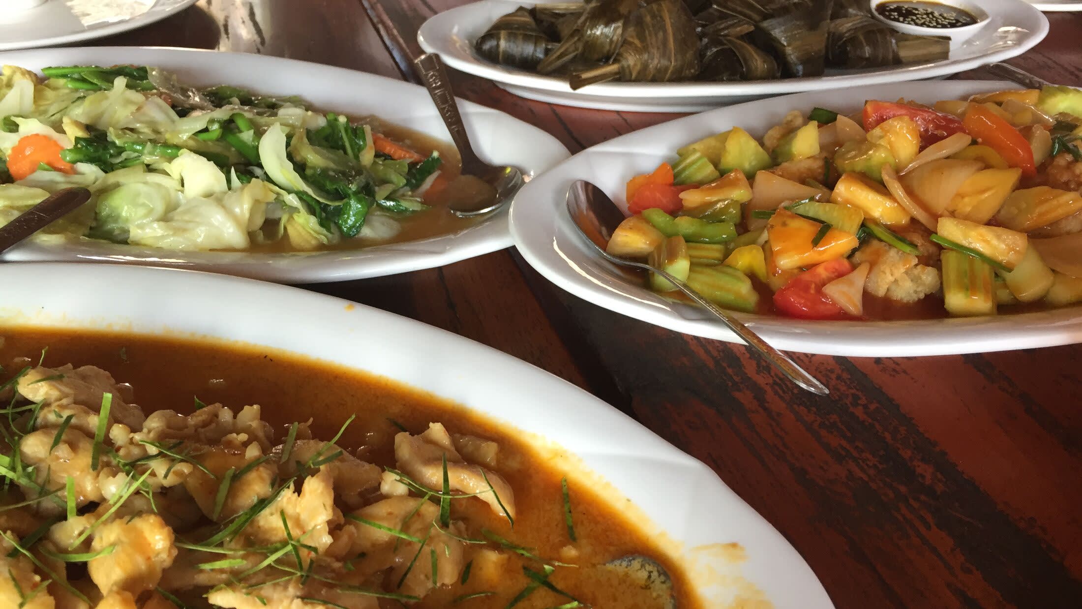 a bowl filled with different types of food on a plate