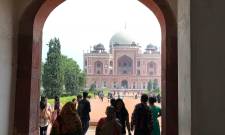 a group of people standing in front of a building
