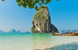 A boat parked on a beach in Krabi, Thailand