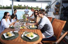 Family dining on Moorings 5800
