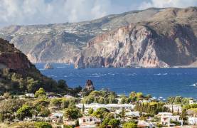 Italian coast with mountains, greenery and blue water