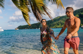 Couple walking at the beach