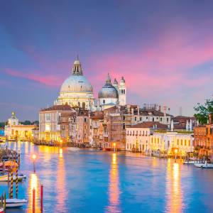 Grand Canal in Venice, Italy with Santa Maria della Salute Basilica twilight