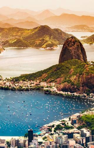 Aerial view of Copacabana beach in Rio de Janeiro showing mountain and city view