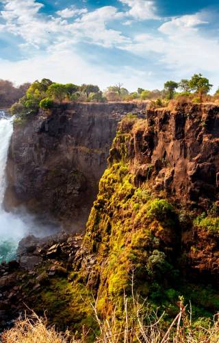 Victoria falls surrounded by mountains in Zambia