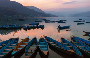 Boats on Phewa Lake at Sunset