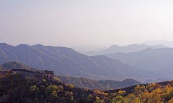 a view of a large mountain in the background
