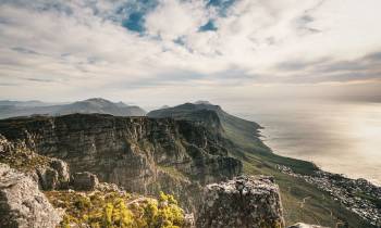 a canyon with a mountain in the background