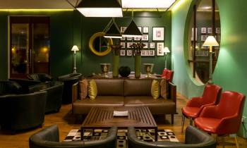 a living room with a leather chair
