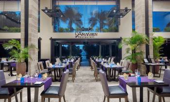 a dining room table in front of a building