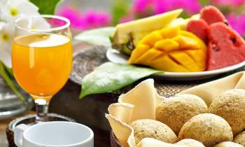 a plate of food and a cup of coffee