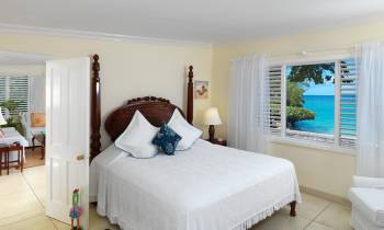 a bedroom with a bed in a hotel room