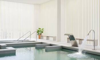 a large pool of water in front of a window