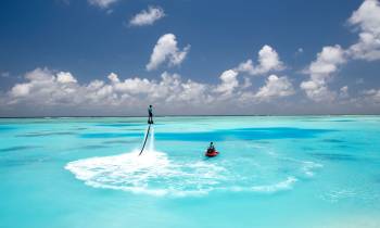a man swimming in a body of water