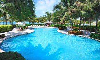 a pool next to a body of water