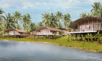 a small house in a body of water