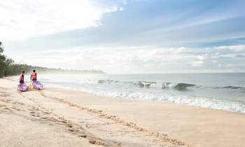 a group of people on a beach