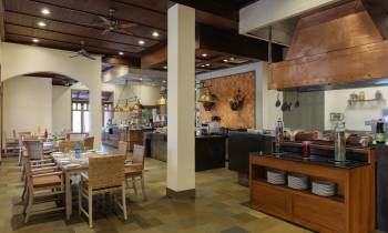 a kitchen with a dining room table