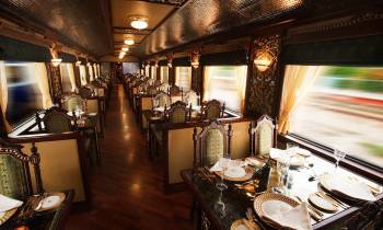 Dining table for 4 inside a coach of the Maharaja Express