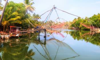 Fishing nets spread over a river in Cochin, Kerala