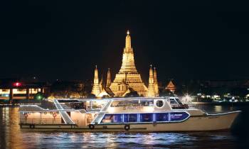 a boat that is lit up at night