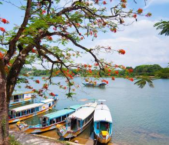 A boat station at Perfume River near Thien Mu pagoda, Hue, Vietnam, Asia
