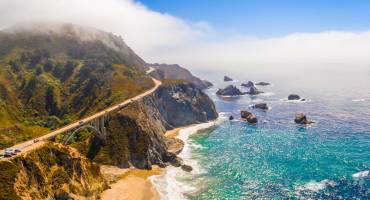 Arial view of the California Bixby bridge in Big Sur in the Monterey County along side State Route 1 US, the ocean road.