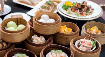 Enchanting Travels China Tours Arrangment of various dim sum in bamboo steamer