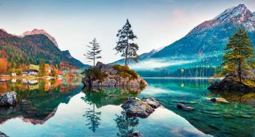 Enchanting Travels Germany Tours Beautiful autumn scene of Hintersee lake.