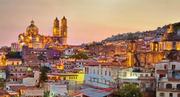 Enchanting Travels Mexico Tours Panorama of Taxco city at sunset in Mexico - things to do in Mexico - Mexico holiday