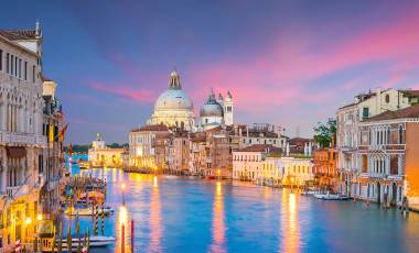 Grand Canal in Venice, Italy with Santa Maria della Salute Basilica twilight