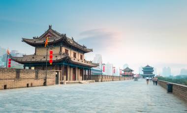 Enchanting Travels China Tours beautiful xian city wall and ancient tower at dusk, China