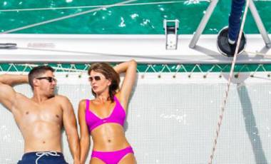 a couple relaxing on a yacht