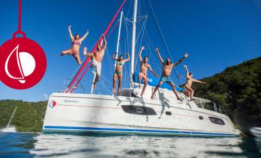 people jumping off yacht