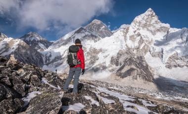 traveller looking at Mount Everest